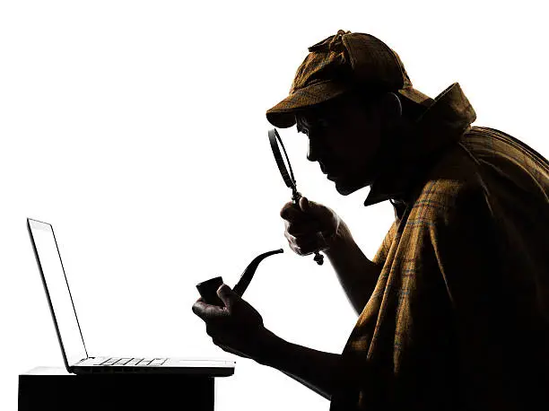 Photo of sherlock holmes laptop computer silhouette