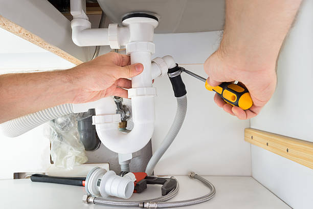 istock Plumber Repairing Sink In Bathroom 470237154