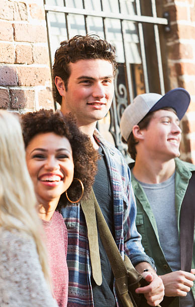 istock Young man with group of friends 470237192