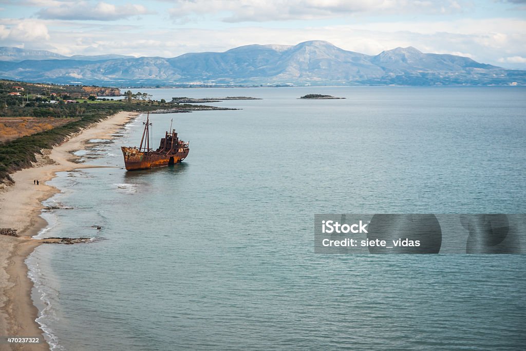 Shipwreck, Peloponnese, Greece Image of shipwreck near sandy beach, Peloponnese, Greece 2015 Stock Photo