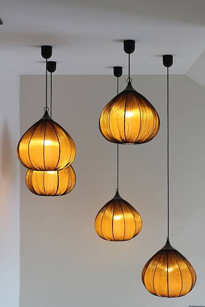 istock Round stylish lampshades hang from ceiling 470241688