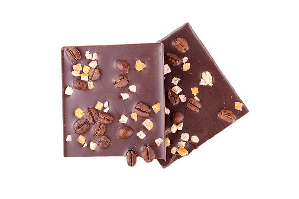 istock few pieces chocolate with coffee on a white background 470247248