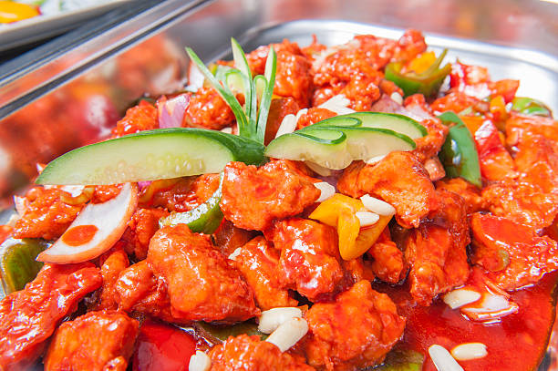 plate of Asian cuisine chicken and fried rice at a buffet..More FOOD And Table Setting images: