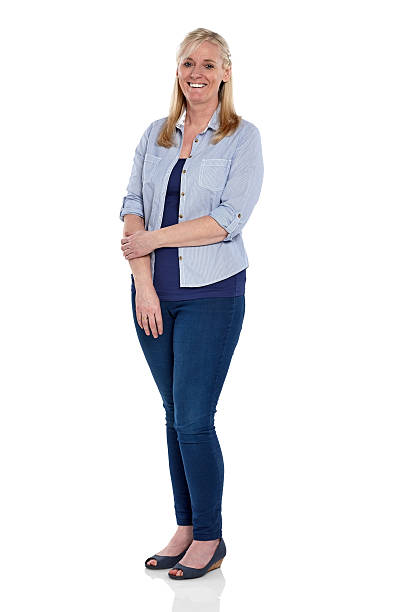 istock Attractive mature woman standing in studio 470249542
