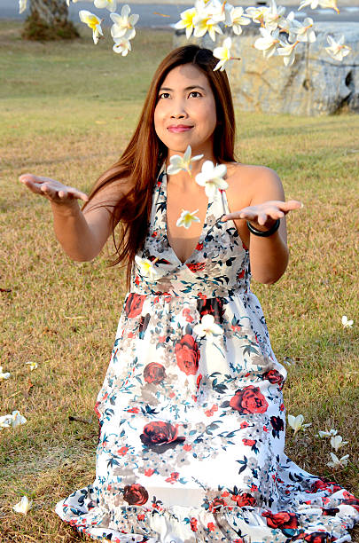 istock Woman flow white flowers 470251113