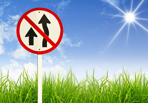 istock Traffic sign and fresh spring green grass 470252123