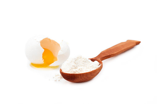 eggs and flour isolated on the white