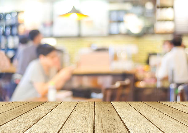 istock Perspective wood and blurred cafe with bokeh light background 470252432