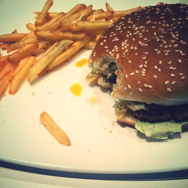 istock hamburger with french fries chips 470257521