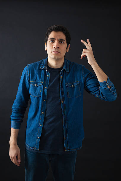 istock Handsome men doing different expressions in different sets of clothes 470261630