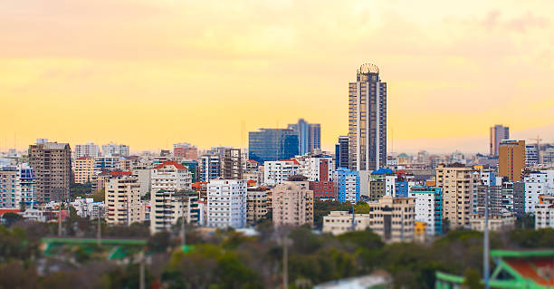 Sunset cityscape of Santo Domingo, Dominican Republic Skyline of the city of Santo Domingo, Dominican Republic with a tilt-shift effect dominican republic stock pictures, royalty-free photos & images