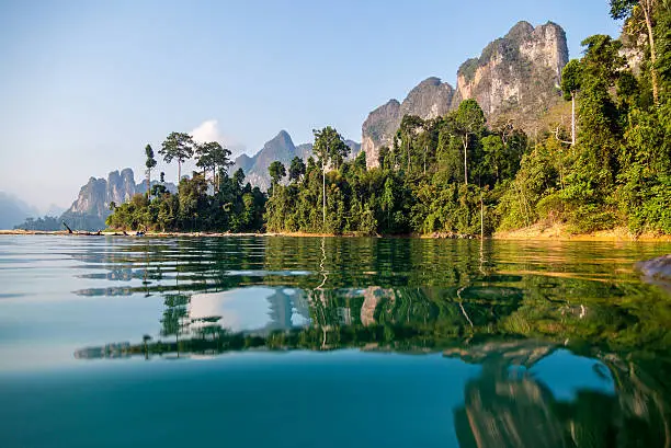 Photo of Beautiful view of a lake beside a mountainside