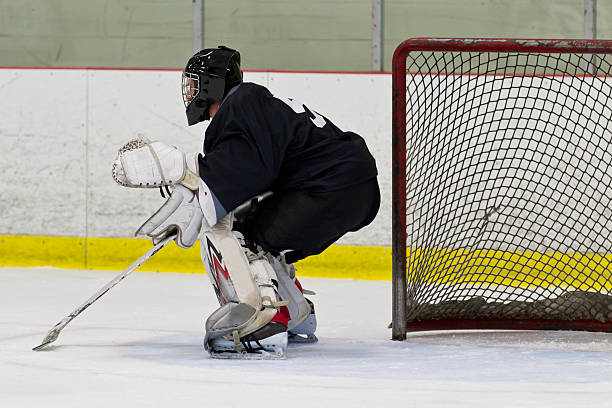 istock Goalie in his net during an ice hockey game 470269979