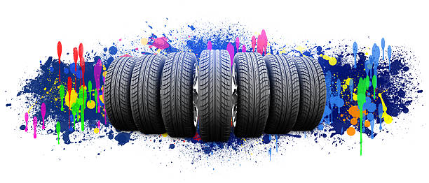istock Seven new car wheels. Abstract background is colored blots 470273276