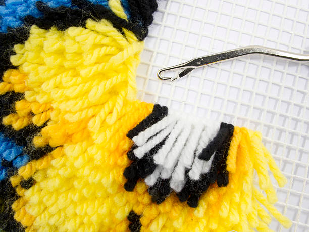 Latch Hook Rug stitch Latch Hook Rug stitch with canvas and yarn latch photos stock pictures, royalty-free photos & images