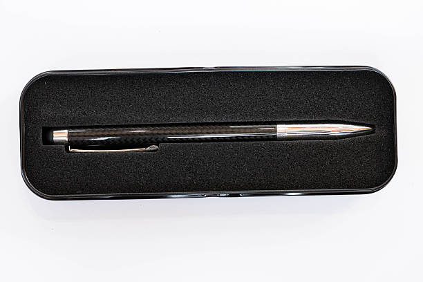 istock Metallic pen isolated on white background in metallic box 470289448
