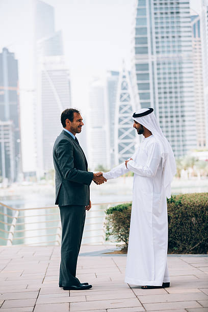istock Businessmen in Dubai handshake 470292868