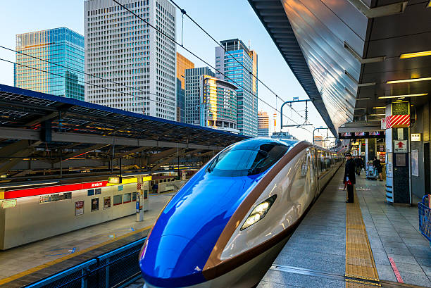 Shinkansen Tokyo, Japan - January 3, 2015: A Shinkansen train pulls into Tokyo Station on January 3, 2015 in Tokyo, Japan. high speed train photos stock pictures, royalty-free photos & images
