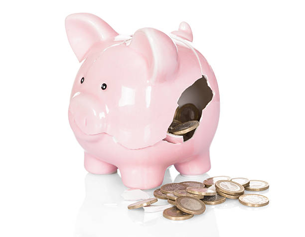 istock Broken Piggy Bank With Money 470296600