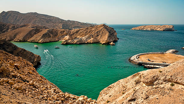 istock Turquoise Lagoon Oman Coast with hidden beautiful beach 470300164