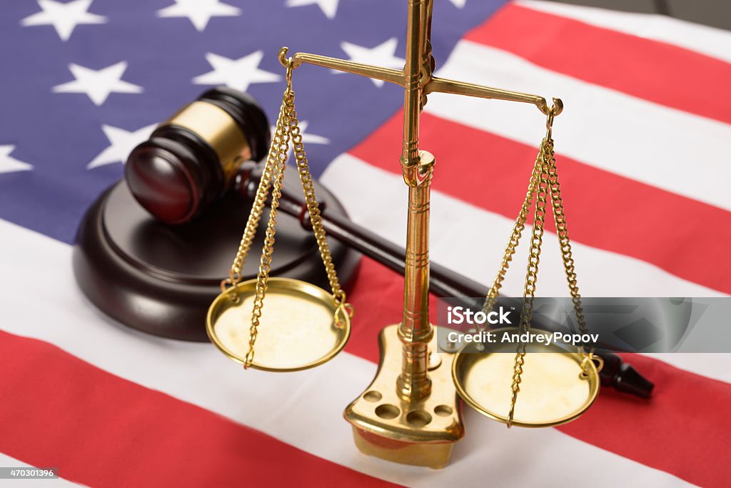 Justice Scale And Wood Gavel On Usa Flag Justice Scale And Wooden Brown Gavel On Usa Flag 2015 Stock Photo