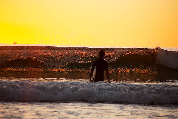 istock Heading out to the surf 470304388