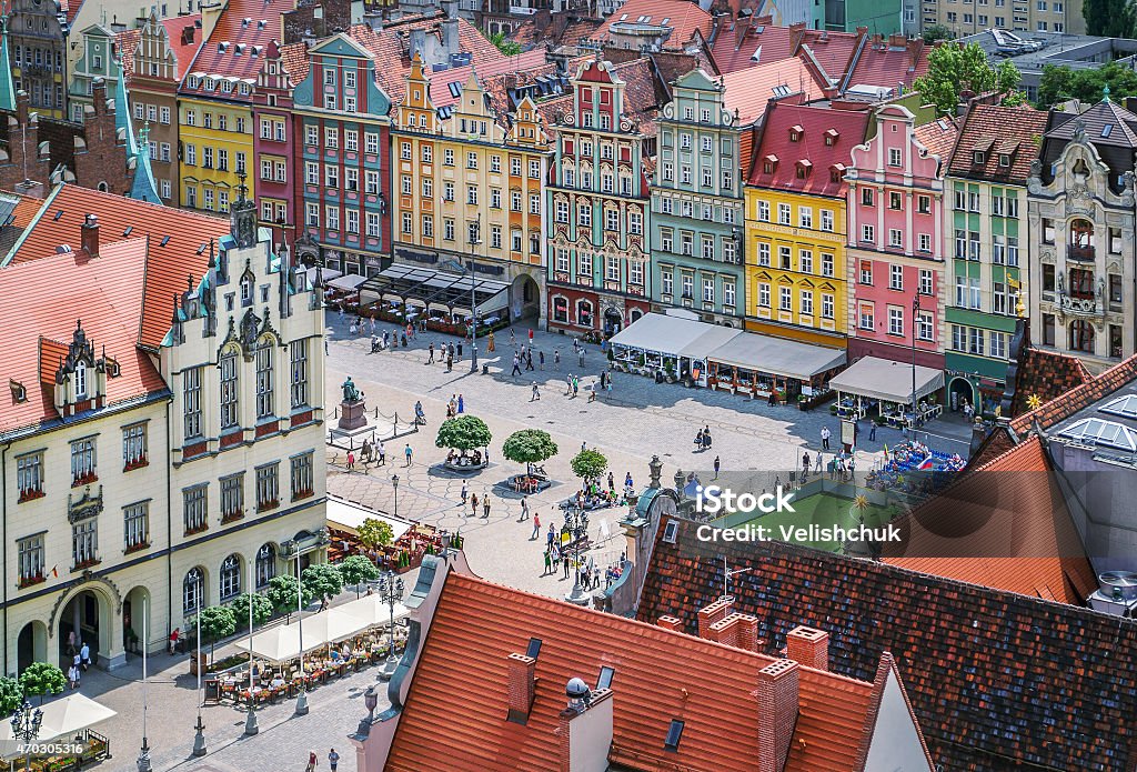 People walking on the market square in Wroclaw, Poland. People walking on the market square in Wroclaw, Poland. Top view. Wroclaw Stock Photo