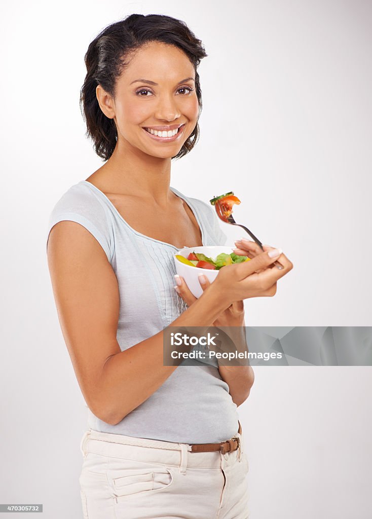 Nothing beats a healthy meal Studio shot of a young woman eating a bowl of saladhttp://195.154.178.81/DATA/i_collage/pi/shoots/781271.jpg 2015 Stock Photo