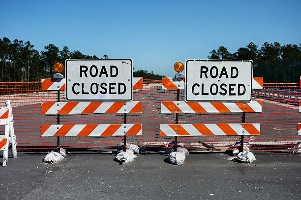 istock Road Closed barricades 470307097