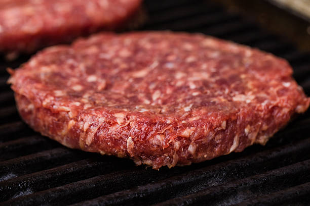 istock Preparing a batch of  grilled ground beef patties or frikadeller 470308974