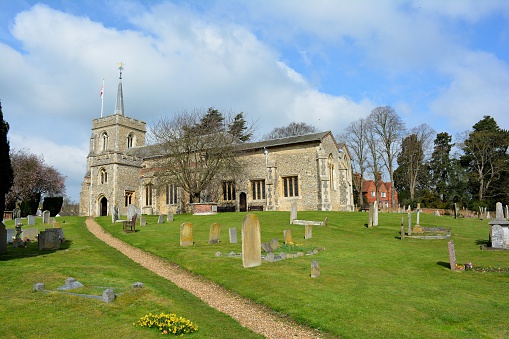 The church of St Peter and St Paul in Kimpton.  This flint-built parish church is in a transitional style between Norman and Early English. The Dacre Chapel has a Perpendicular screen, and the remains of early wall paintings in the chancel show St Christopher and the Seven Corporal Works of Mercy.