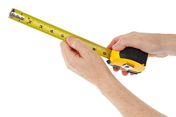 istock Close-up of a Person Using a Tape Measure 470309462