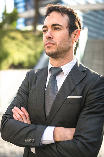 istock Successful business man with arm crossed 470309506
