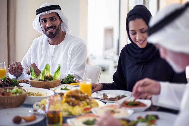 istock Middle Eastern man eating with family 470309978