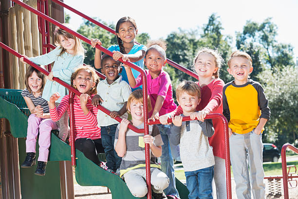 istock Group of multracial children on a playground 470310514