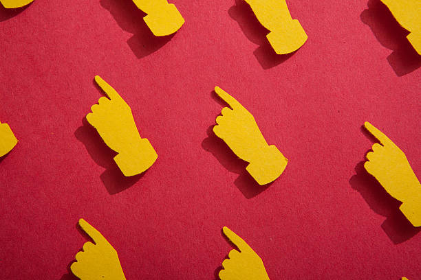 istock Antique hand cutouts pointing the way 470310612