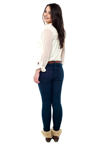 istock Back pose of a pretty young girl 470311342