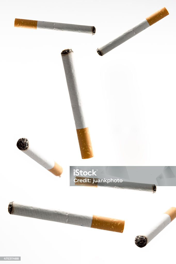 cigarettes cigars flying in the air. 2015 Stock Photo