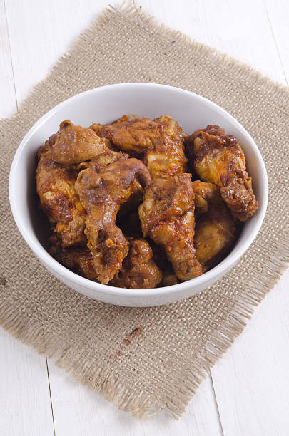 istock buffalo style chicken wings in a bowl 470314360