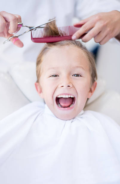 istock Boy at the hairdresser 470314374