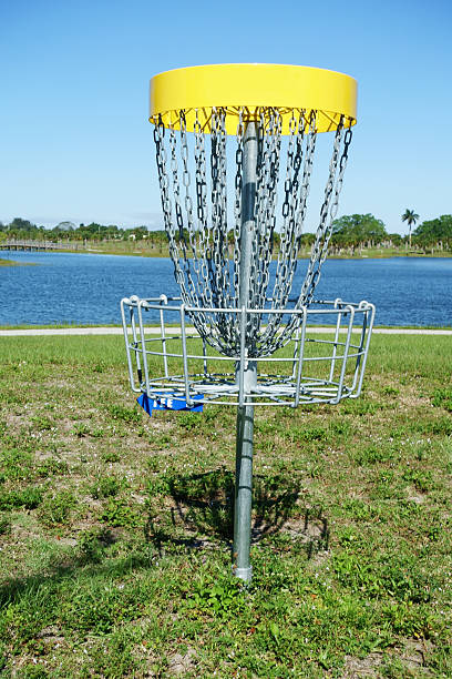 istock Disc golf sports equipment in public park 470314530