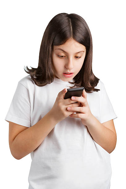 istock Little Girl Surprised by Text Message 470314670