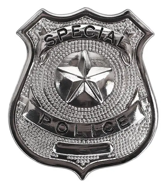 Photo of Silver special police badge on white background