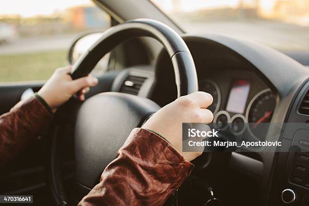 Closeup Of Hands On Car Steering Wheel At 10 And 2 Stock Photo - Download Image Now