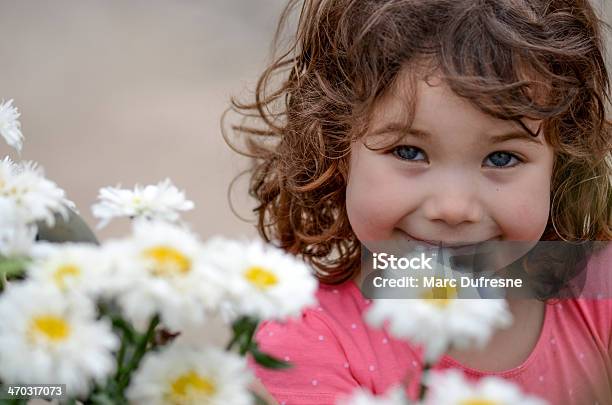 Hiding Behind Daisies Stock Photo - Download Image Now - 4-5 Years, Brat, Child