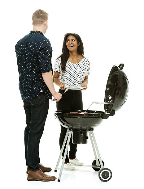 istock Couple together by the barbecue grill 470317584