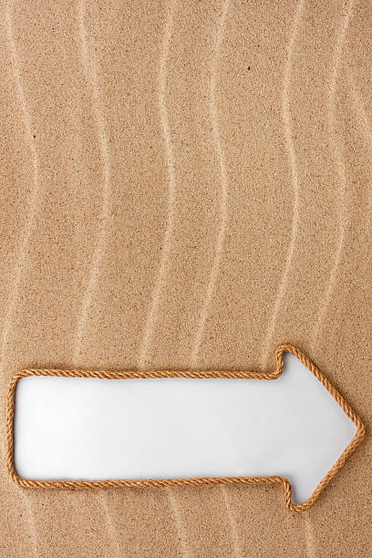 istock Pointer made of rope with  background on the sand 470322618