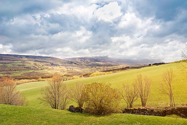 istock Hilly landscape with prairie grass and cloudy overcast sky 470324888