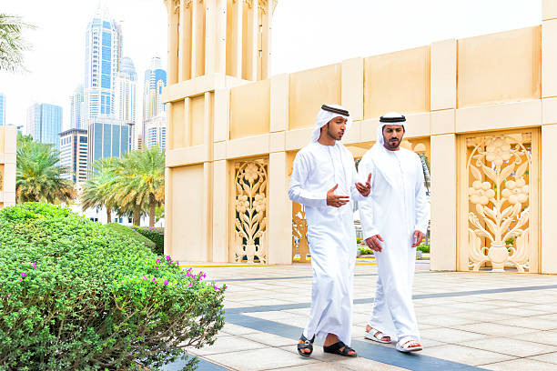istock Two arab business people outside 470325428