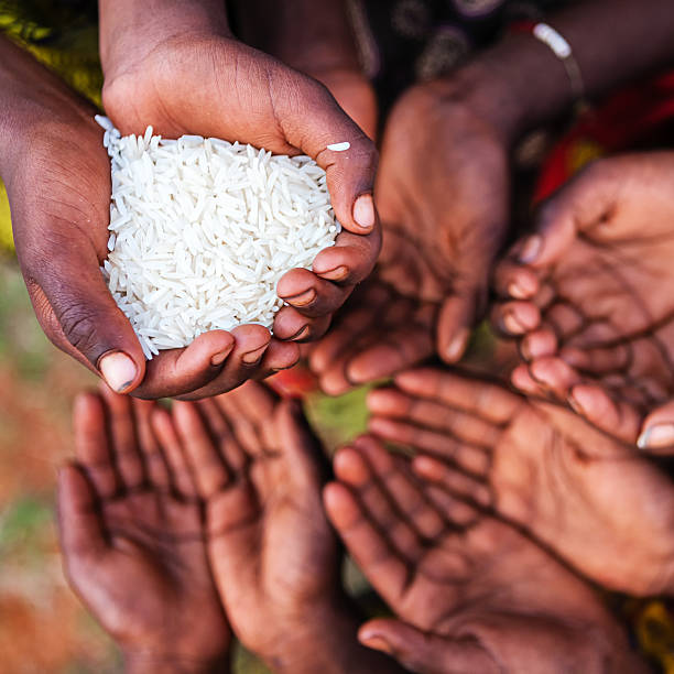 istock Hunger in Africa - hands asking for food 470328802